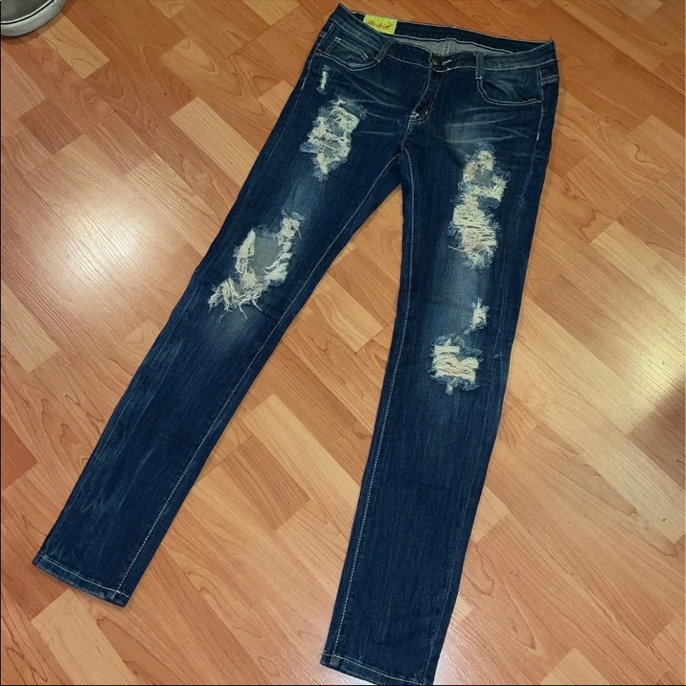 Distressed Machine Jeans